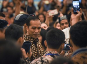 Presiden Jokowi menjawab wartawan usai membuka Kongres XXXVI GAMKI, di Bogor, Jabar, Jumat (14/9) pagi. (Foto: Agung/Humas)
