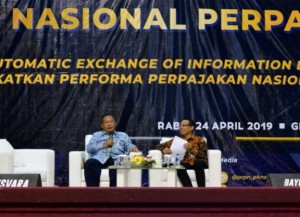 Menko Perekonomian Darmin Nasution saat menghadiri Seminar Nasional Perpajakan di Kampus  Politeknik Keuangan Negara STAN (PKN STAN), Bintaro, Tangerang, Banten, Rabu (24/4). (Foto: Humas Kemenko Perekonomian)